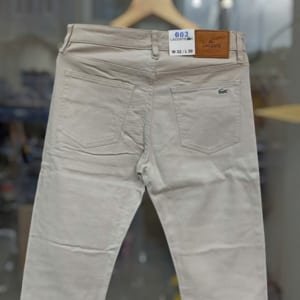 Quần kaki jean Lacoste màu kem